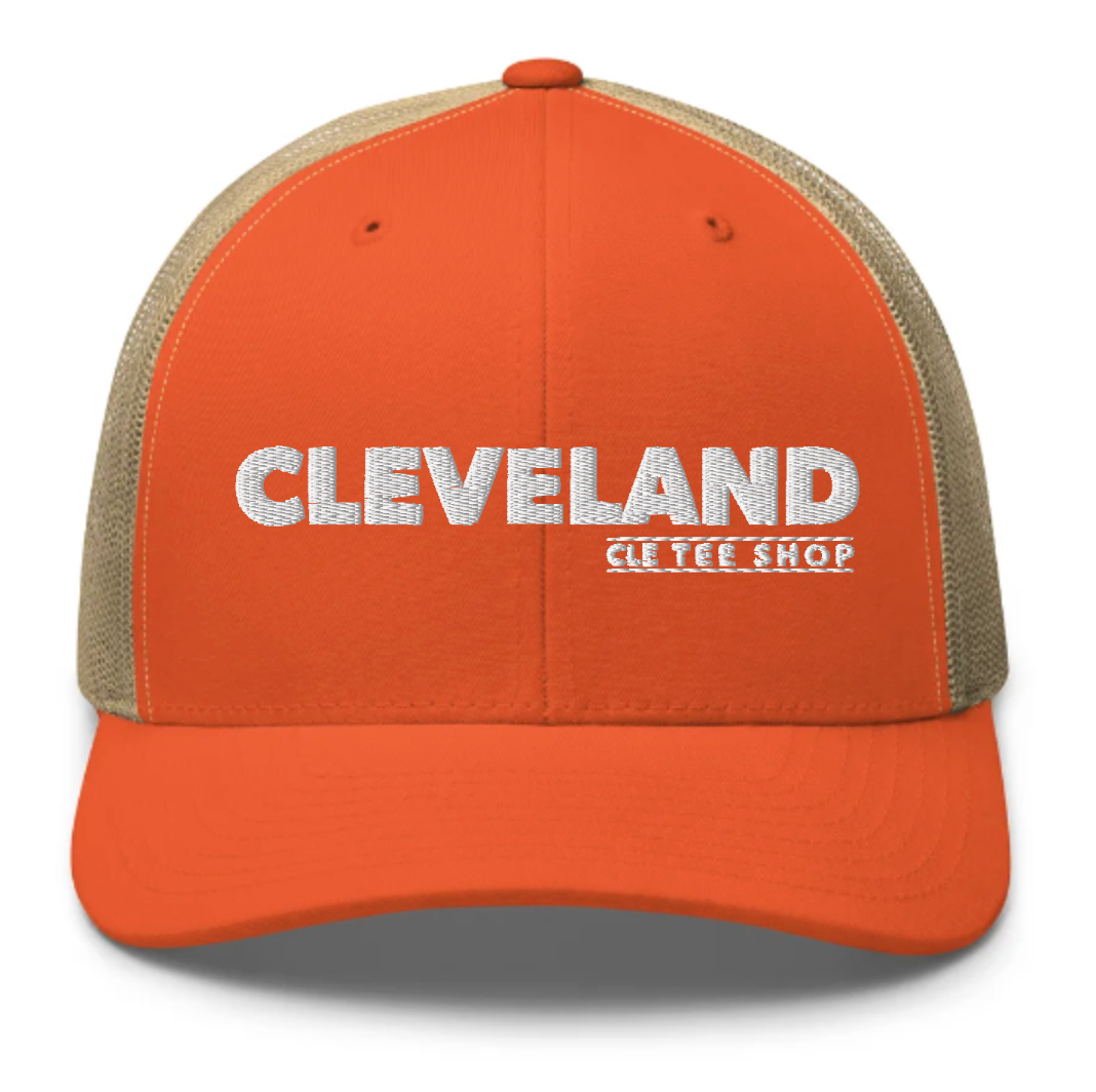 Orange and beige cap with white 'CLEVELAND' and 'CLE TEE SHOP' text on front