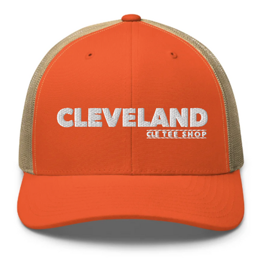 Orange and beige cap with white 'CLEVELAND' and 'CLE TEE SHOP' text on front